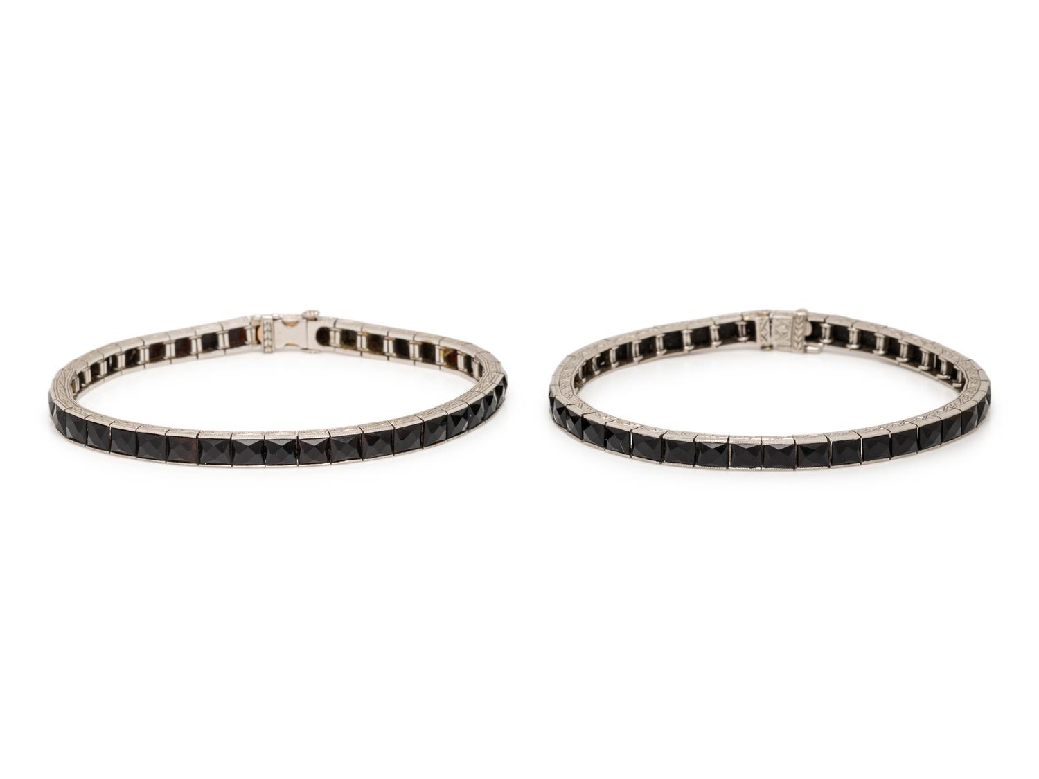 ART DECO, PAIR OF BLACK ONYX AND PLATINUM BRACELETS
