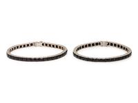ART DECO, PAIR OF BLACK ONYX AND PLATINUM BRACELETS