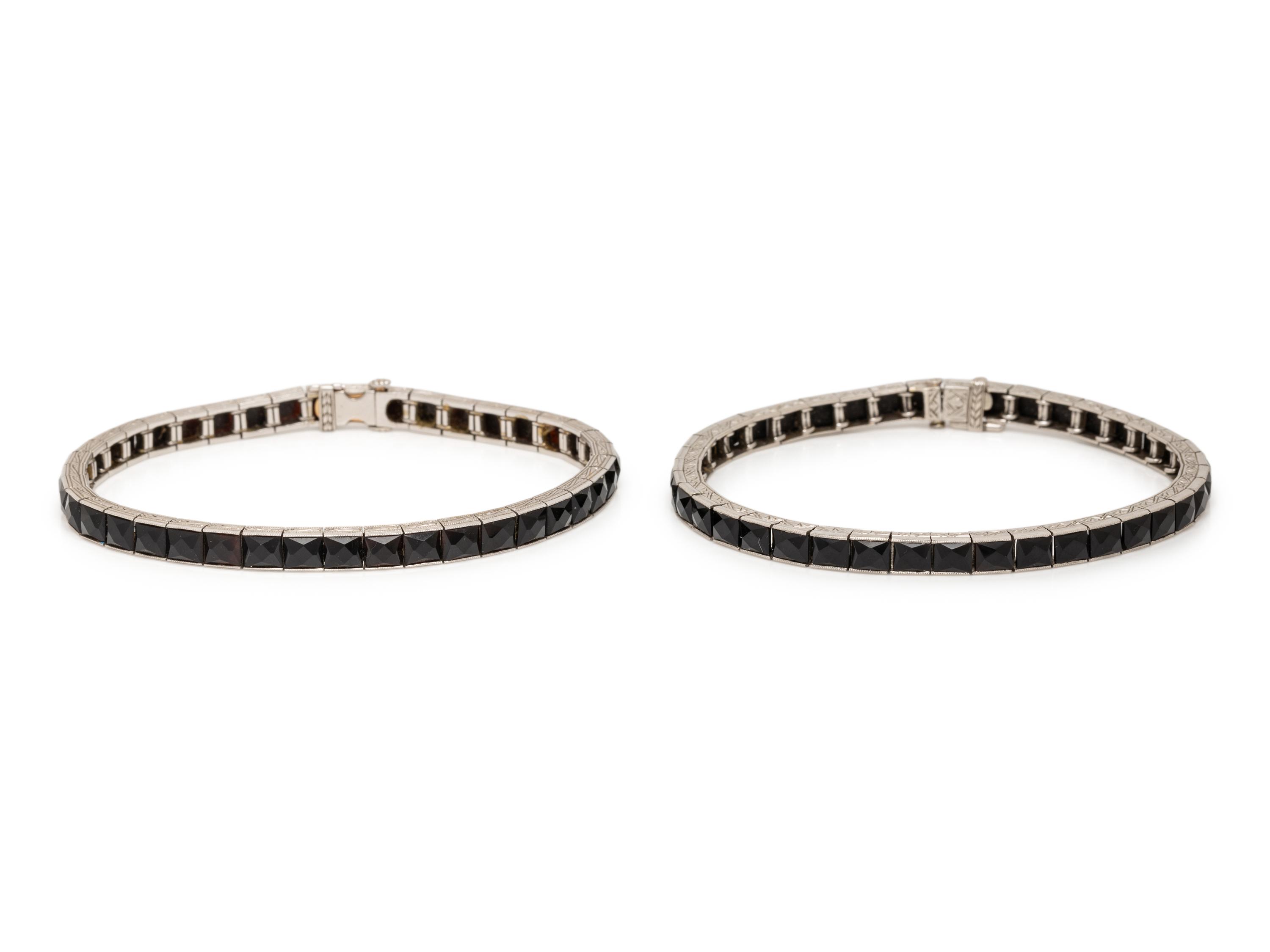 ART DECO, PAIR OF BLACK ONYX AND PLATINUM BRACELETS