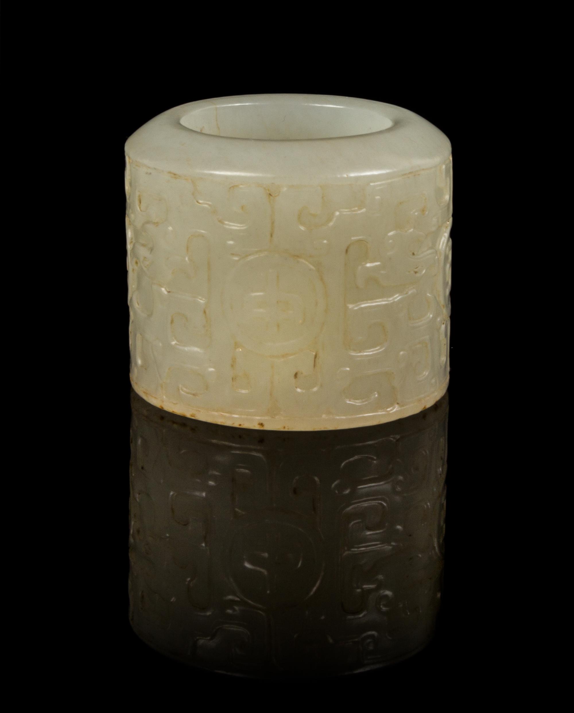 A White Jade Archer's Ring Diameter overall 1 3/8 inches.