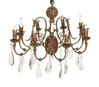 A Pierced Brass Eight-Light Chandelier with Crystal Drops