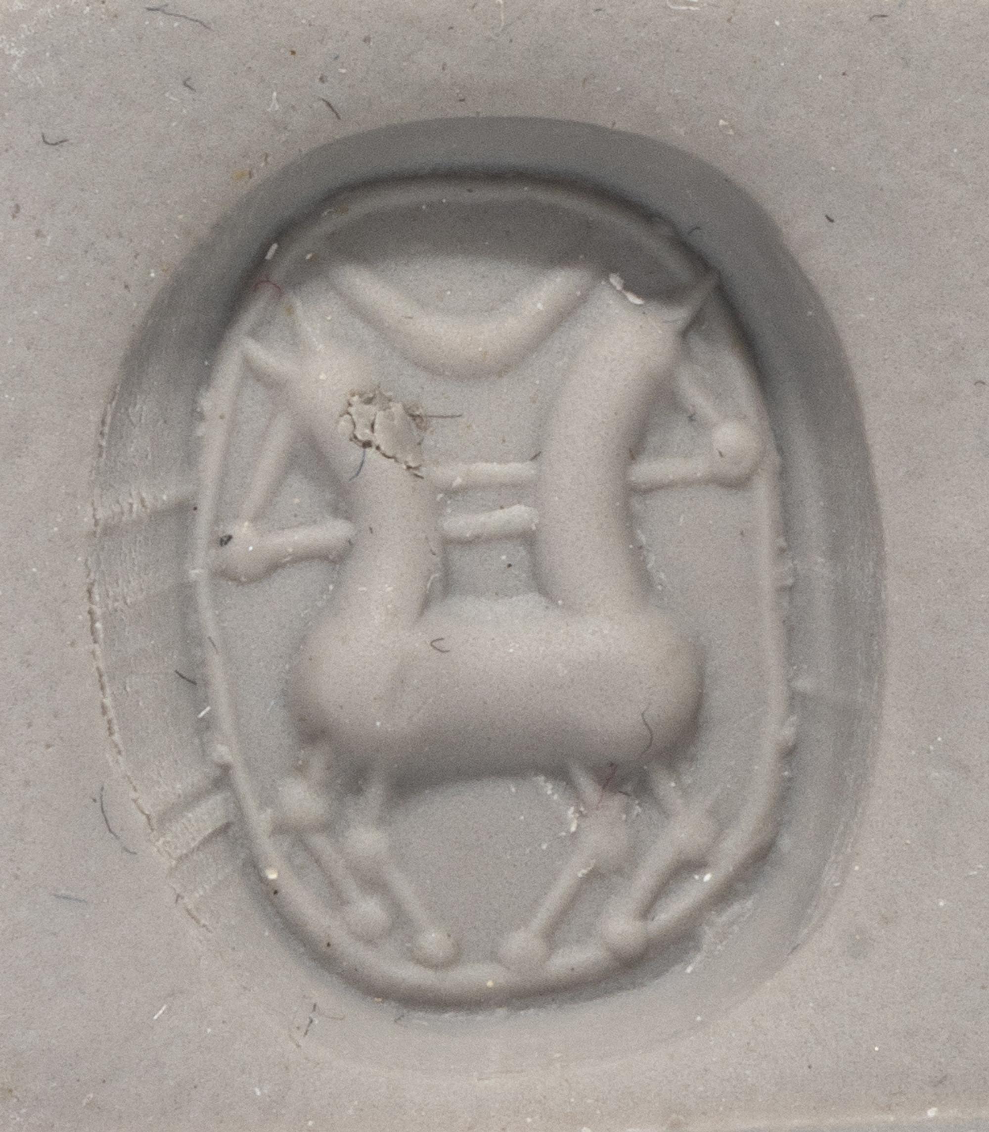 An Etruscan Carnelian Scarab with a Biga Chariot
