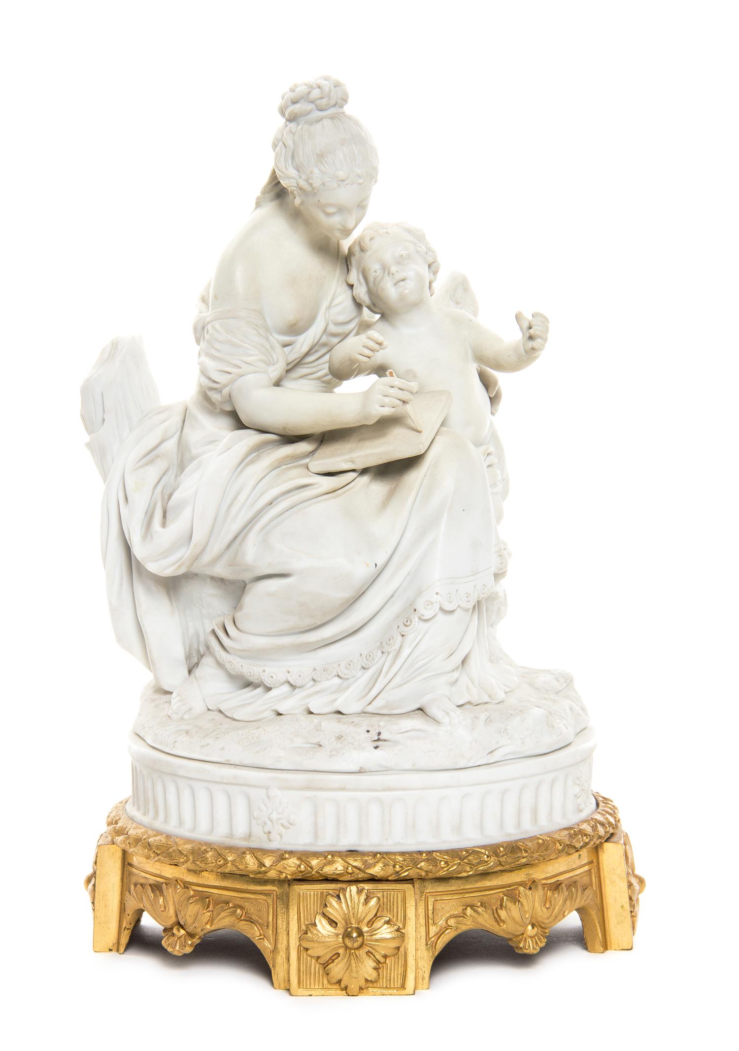 A Sevres Style Bisque Porcelain and Gilt Bronze Mounted Figural Group, Height 9 inches.