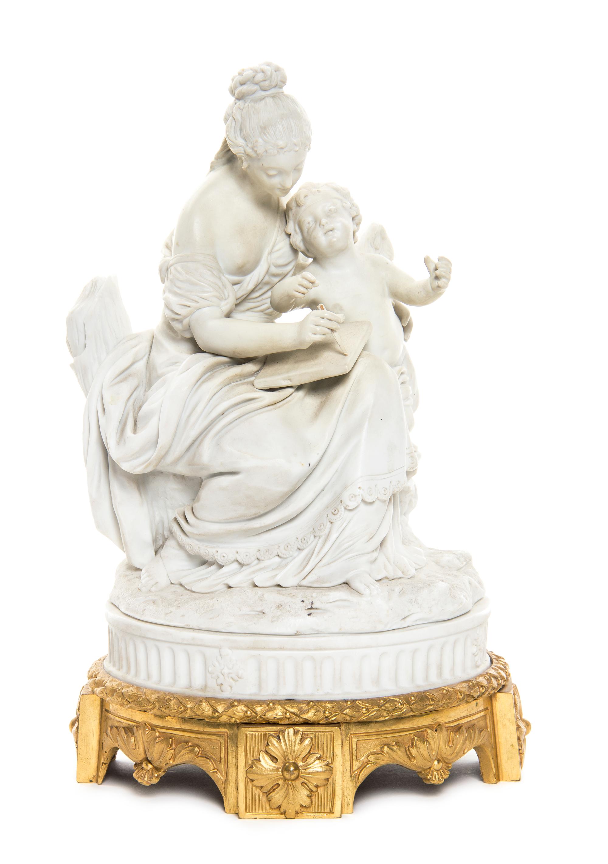 A Sevres Style Bisque Porcelain and Gilt Bronze Mounted Figural Group, Height 9 inches.