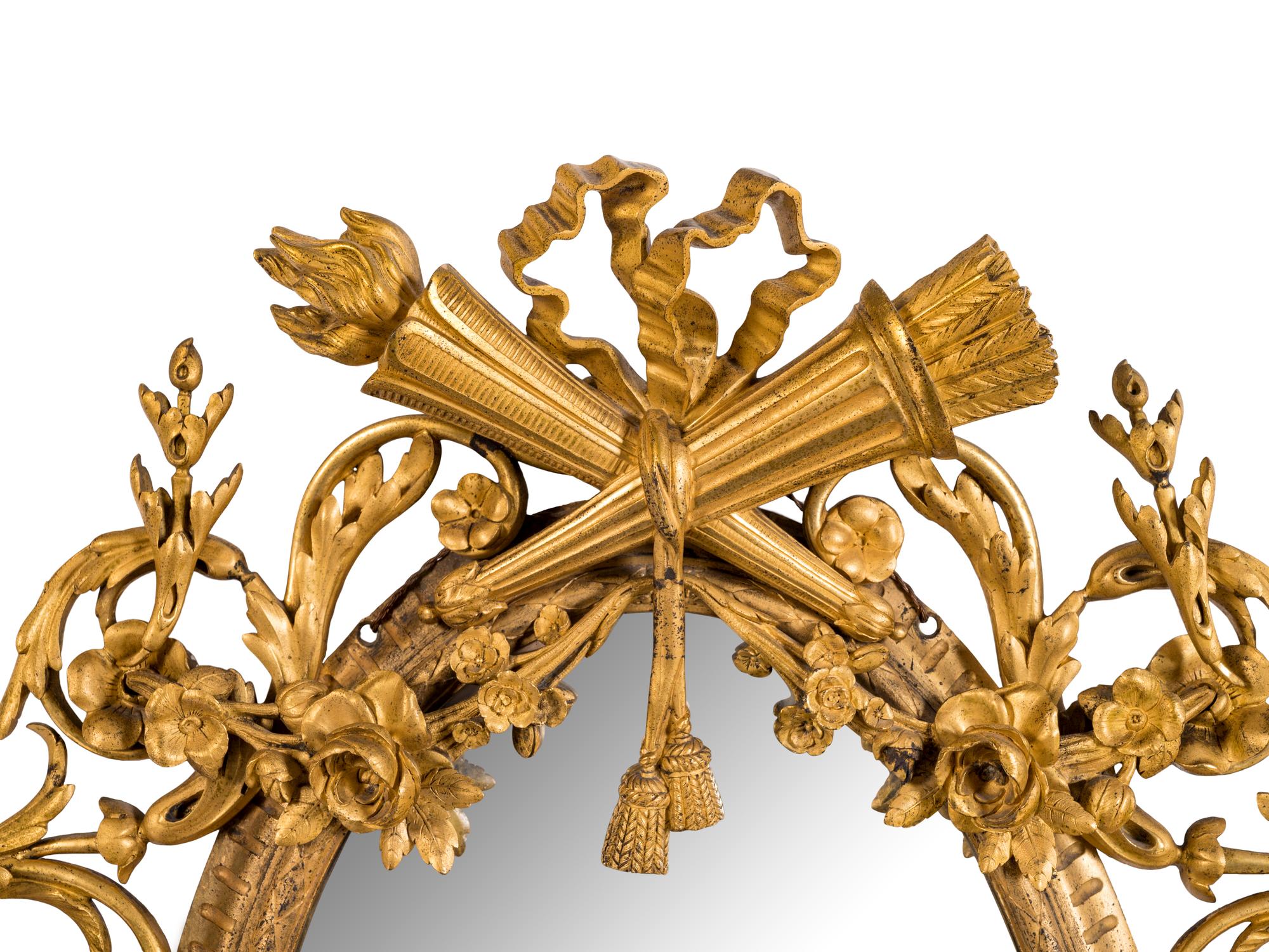 A French Gilt Bronze Mirror in the Manner of François Linke