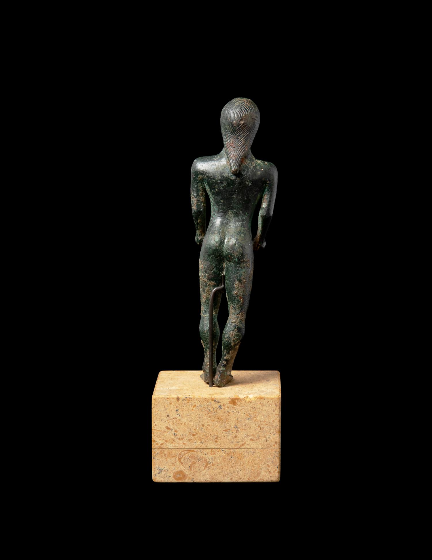 A Greek Bronze Kouros