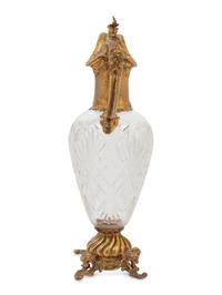 A Gilt Metal Mounted Cut Glass Claret Jug