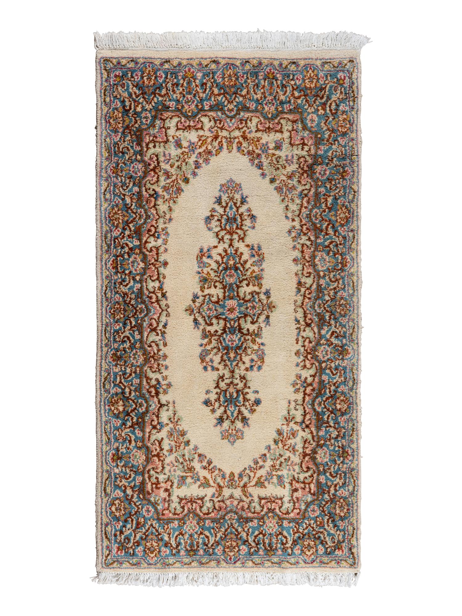 A Kirman Wool Rug