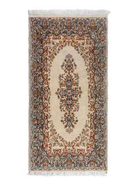 A Kirman Wool Rug