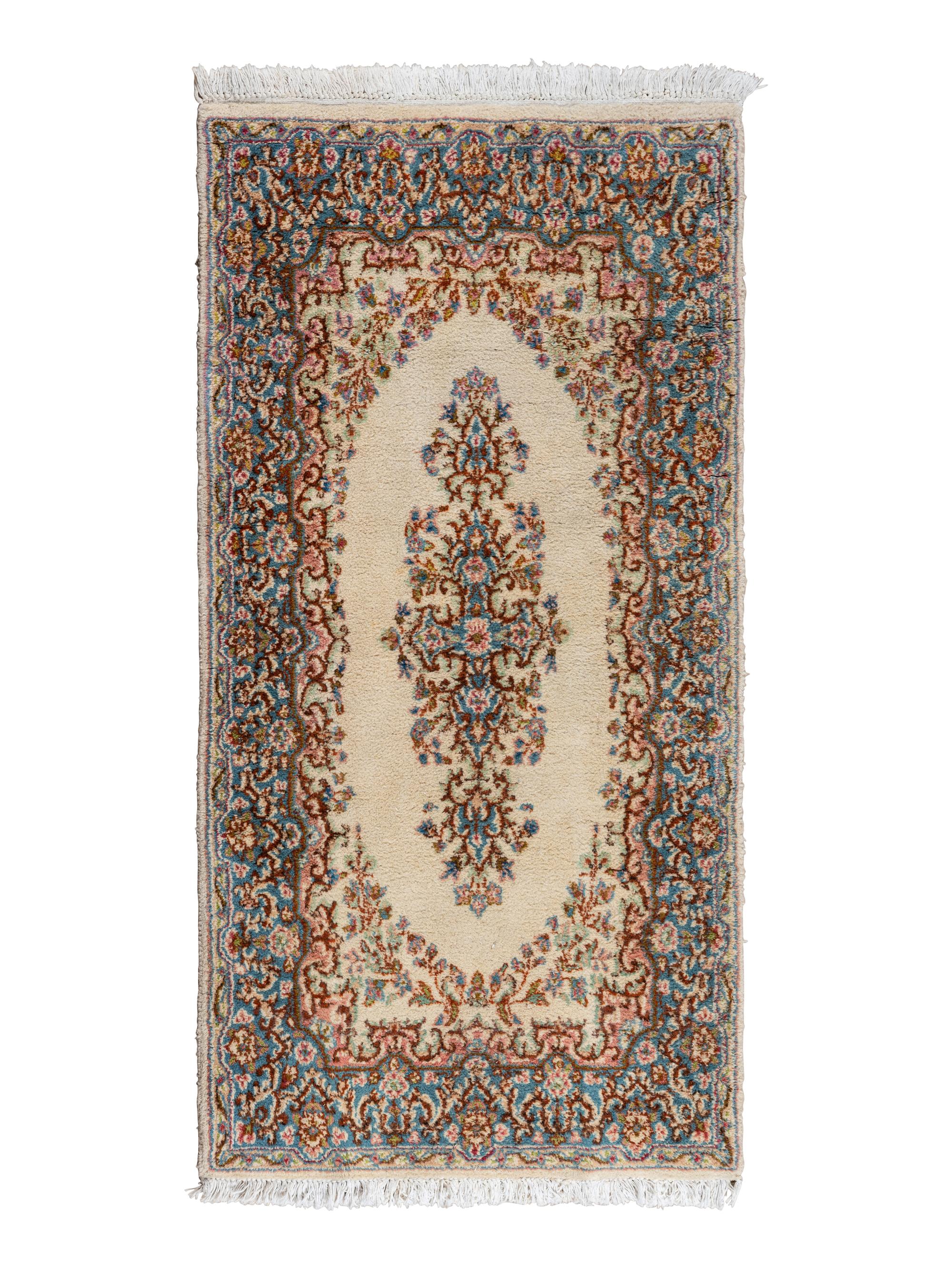 A Kirman Wool Rug