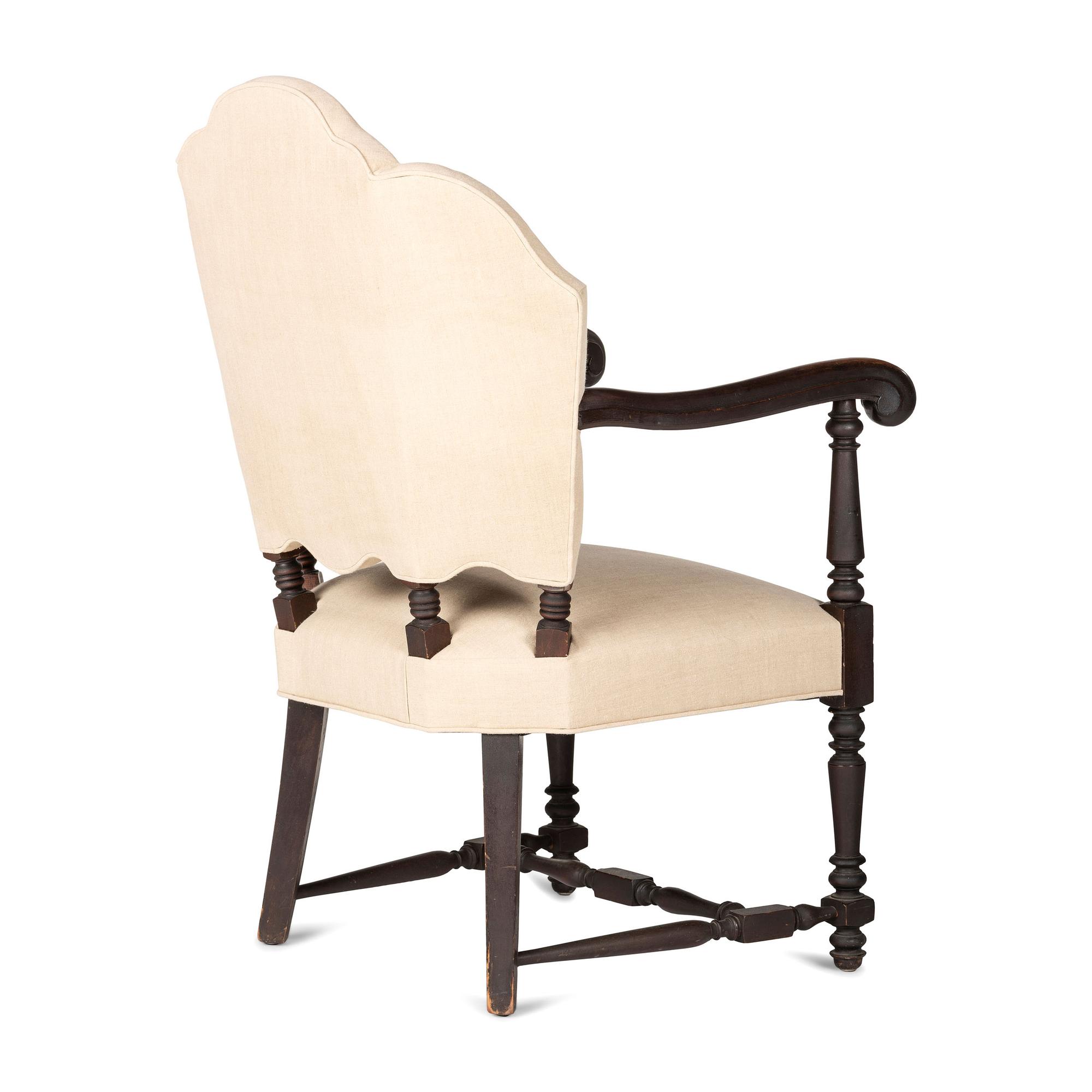 A William IV Carved and Turned Walnut Stretcher Base Library Armchair