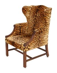 A George III Style Mahogany Wing Chair with Leopard Print Upholstery