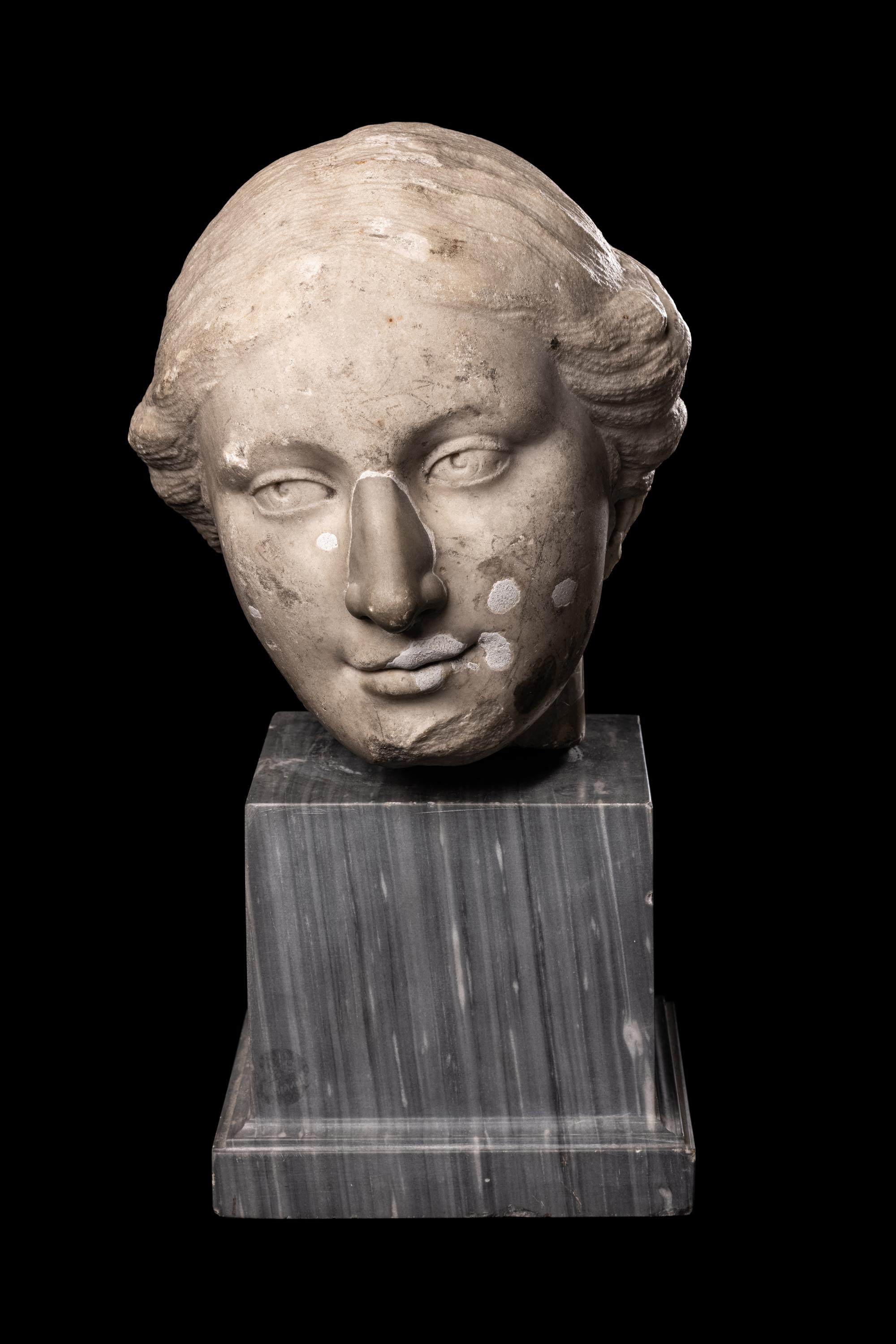 A Roman Marble Portrait Head of a Woman