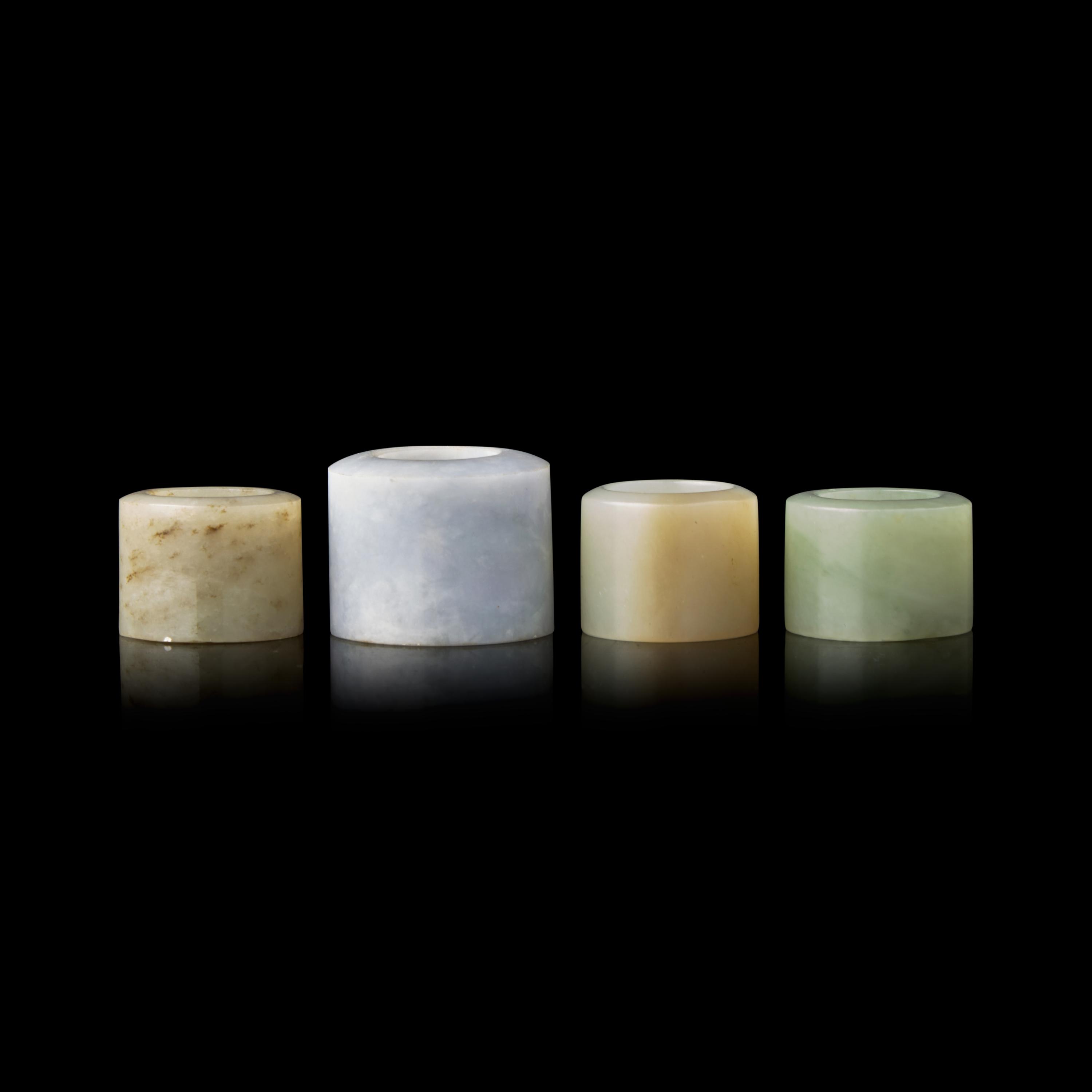 Four Chinese Jade and Jadeite Archer's Rings 翡翠、玉扳指一組四枚