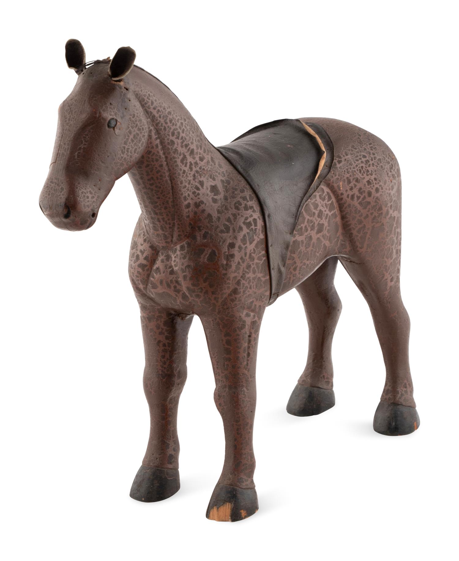 A Folk Art Carved and Painted Wooden Horse