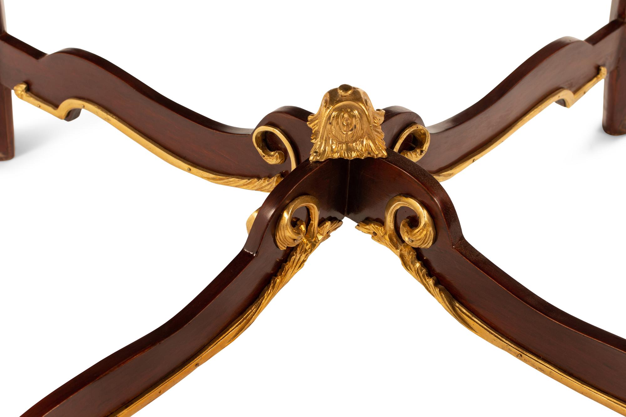 A Pair of Louis XV Style Gilt Bronze Mounted Gueridons with Tiger's Eye Tops