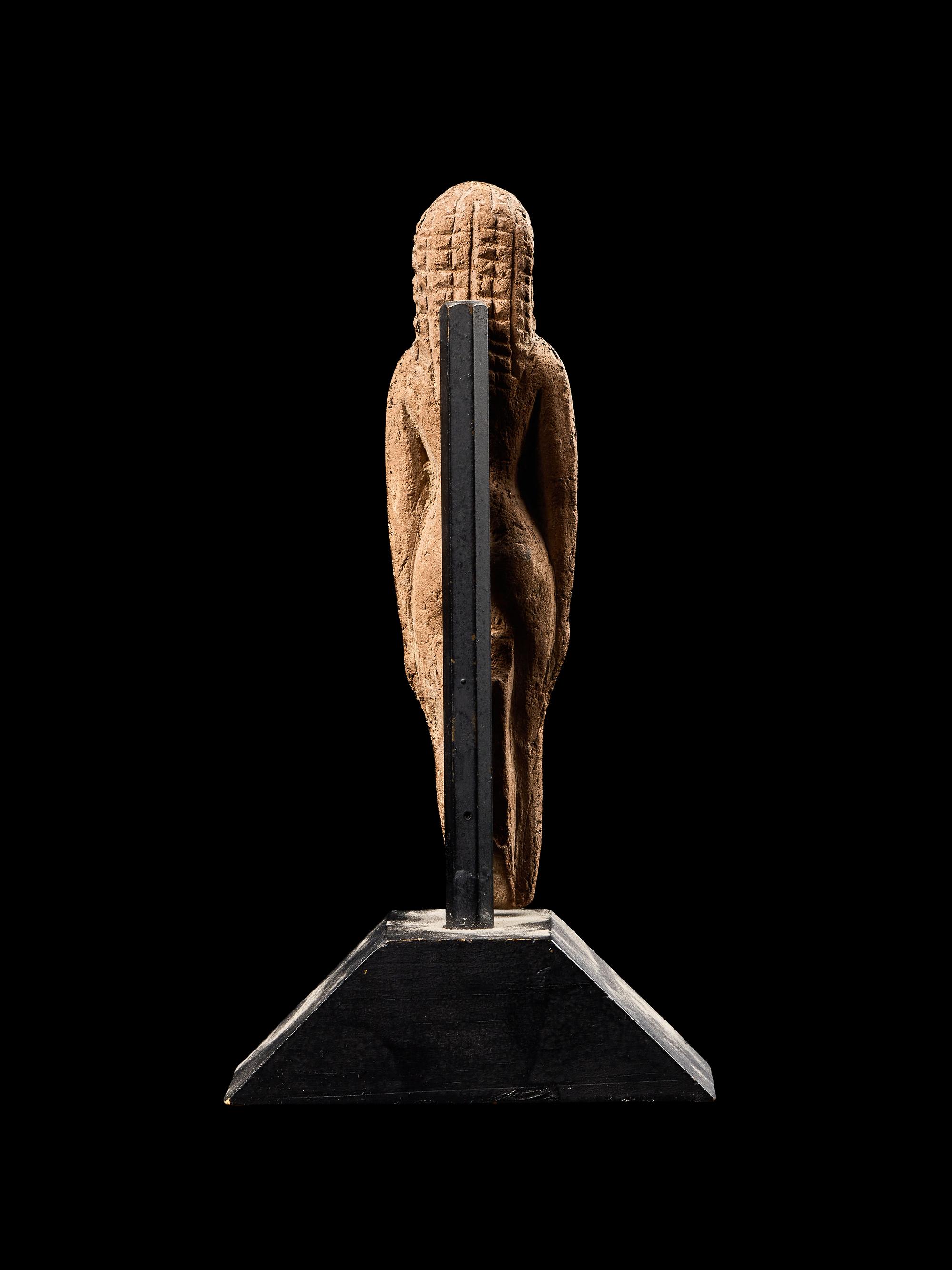 An Egyptian Terracotta Female Figure