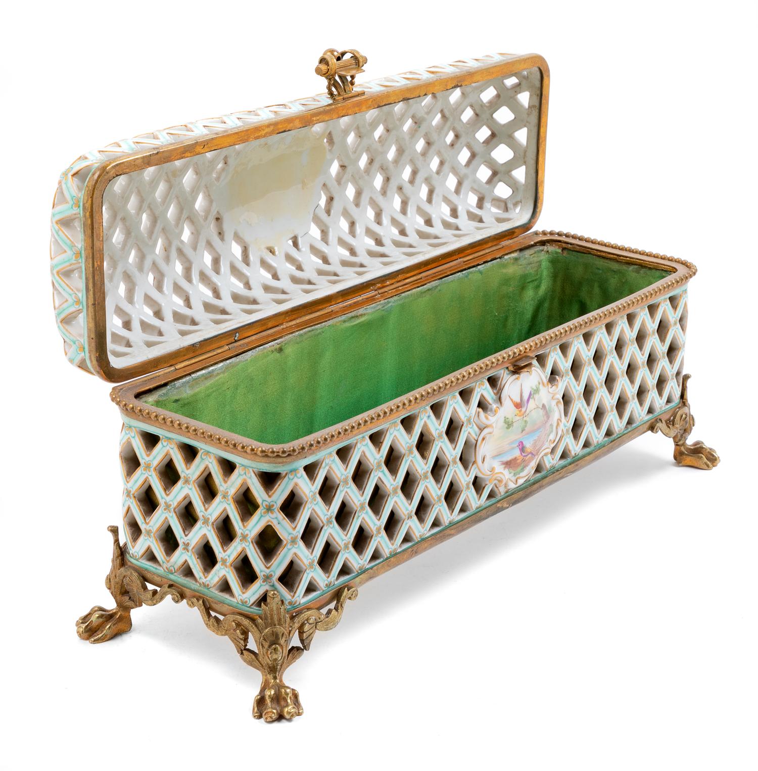 A French Gilt Metal Mounted Porcelain Box Height 7 1/2 x width 15 1/2 x depth 5 1/4 inches. — 19TH CENTURY