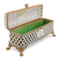 A French Gilt Metal Mounted Porcelain Box Height 7 1/2 x width 15 1/2 x depth 5 1/4 inches. — 19TH CENTURY