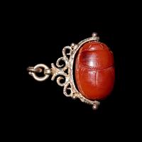 An Etruscan Carnelian Scarab with Warrior on Horseback and a Griffin — Set in a 19th Century gold swivel fob