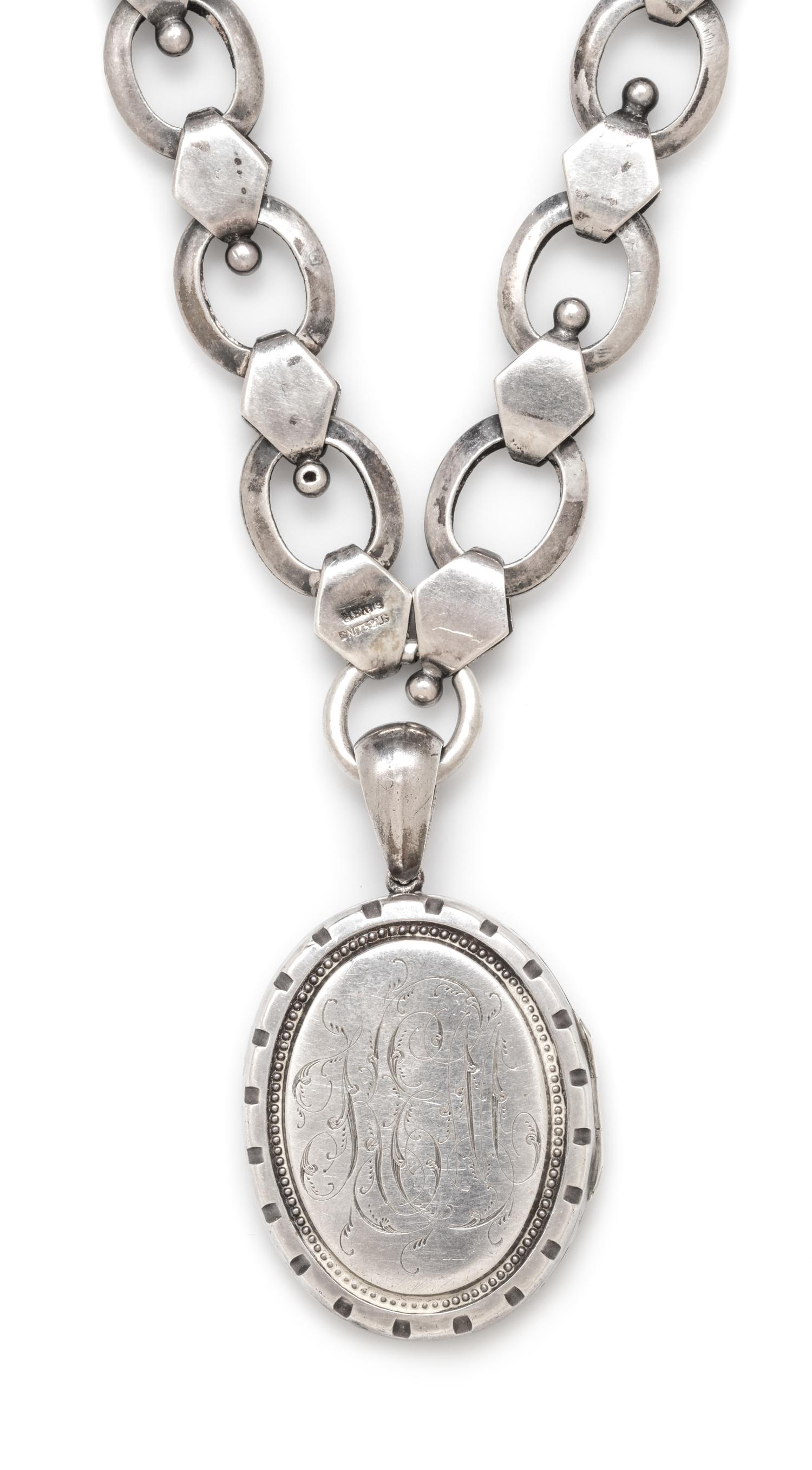A Sterling Silver Box Chain and Locket, 39.50 dwts.