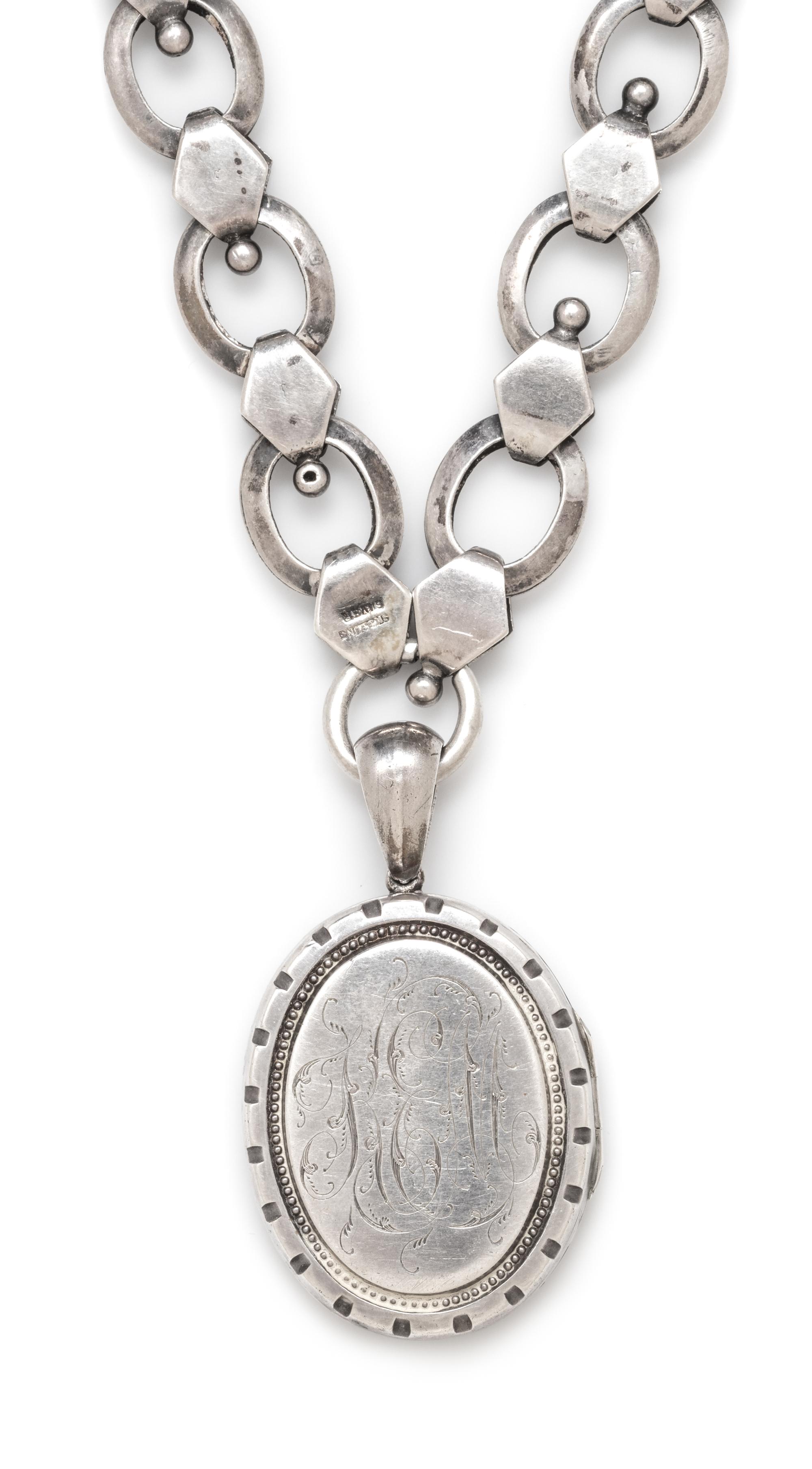 A Sterling Silver Box Chain and Locket, 39.50 dwts.