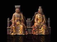 A pair of Chinese gilt lacquer seated figures 漆金木坐像一對