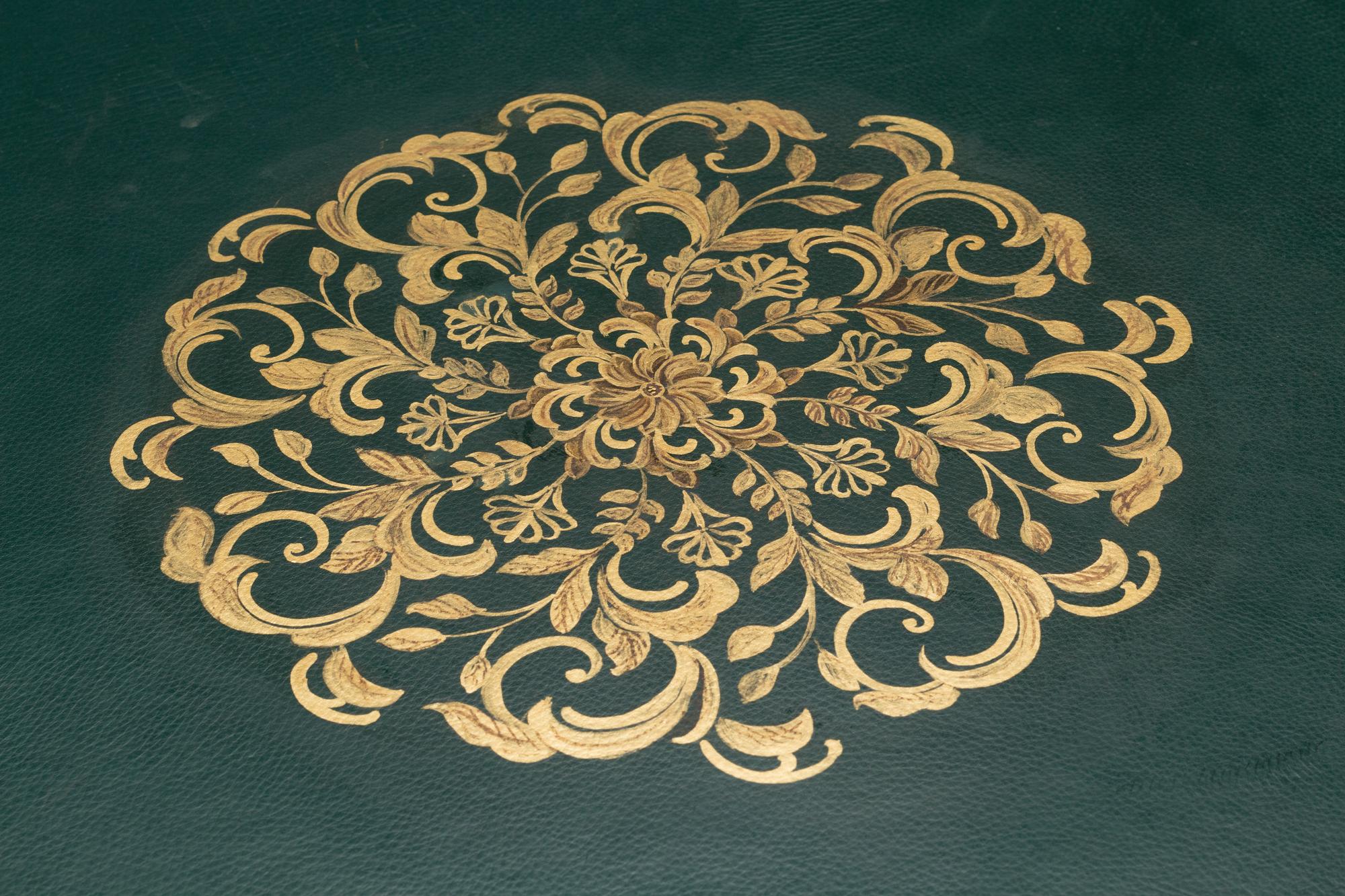 An Empire Style Gilt Bronze Mounted Mahogany Leather-Top Center Table