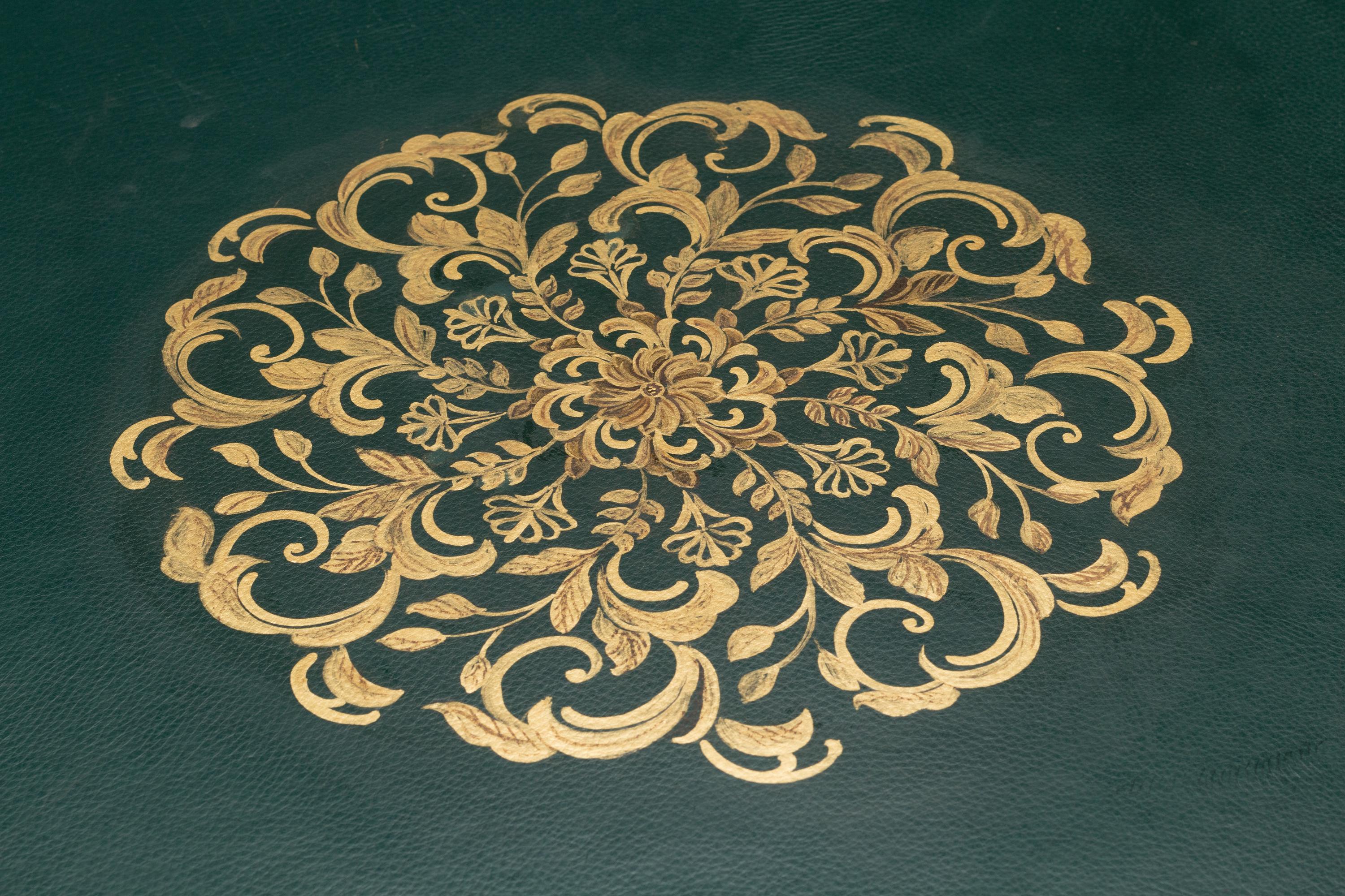 An Empire Style Gilt Bronze Mounted Mahogany Leather-Top Center Table
