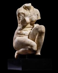 A Roman Marble Crouching Venus
