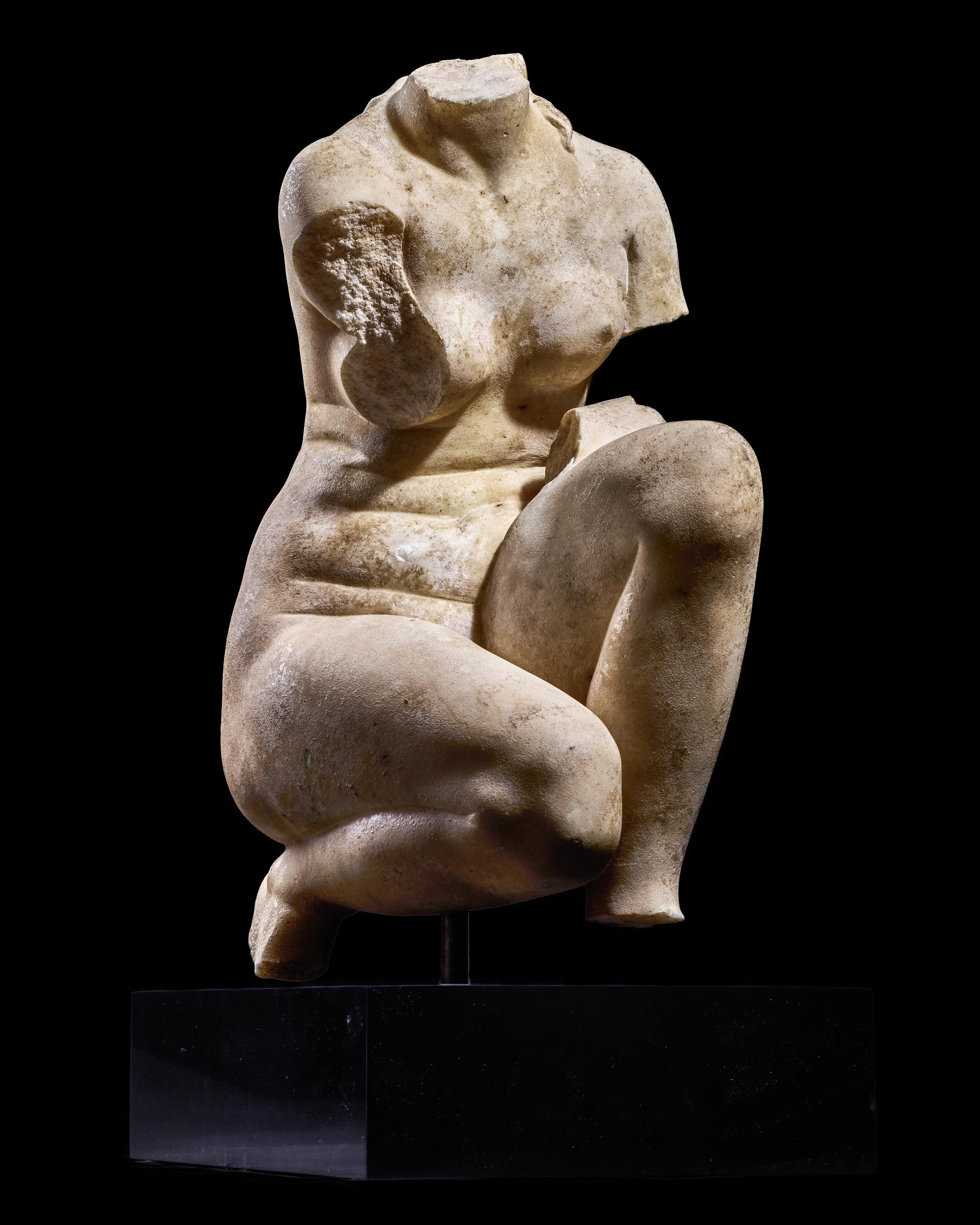 A Roman Marble Crouching Venus
