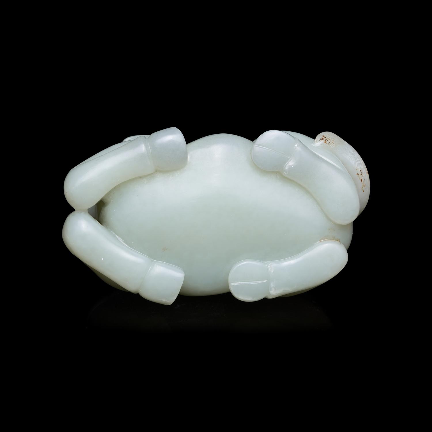 A Chinese Pale Celadon Jade Figure of a Recumbent Buffalo, Qing Dynasty 清 青玉臥牛