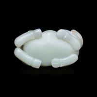 A Chinese Pale Celadon Jade Figure of a Recumbent Buffalo, Qing Dynasty 清 青玉臥牛