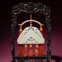 A Chinese White Jade Chime-Form Pendant, 18th/19th Century — 清中期 白玉罄