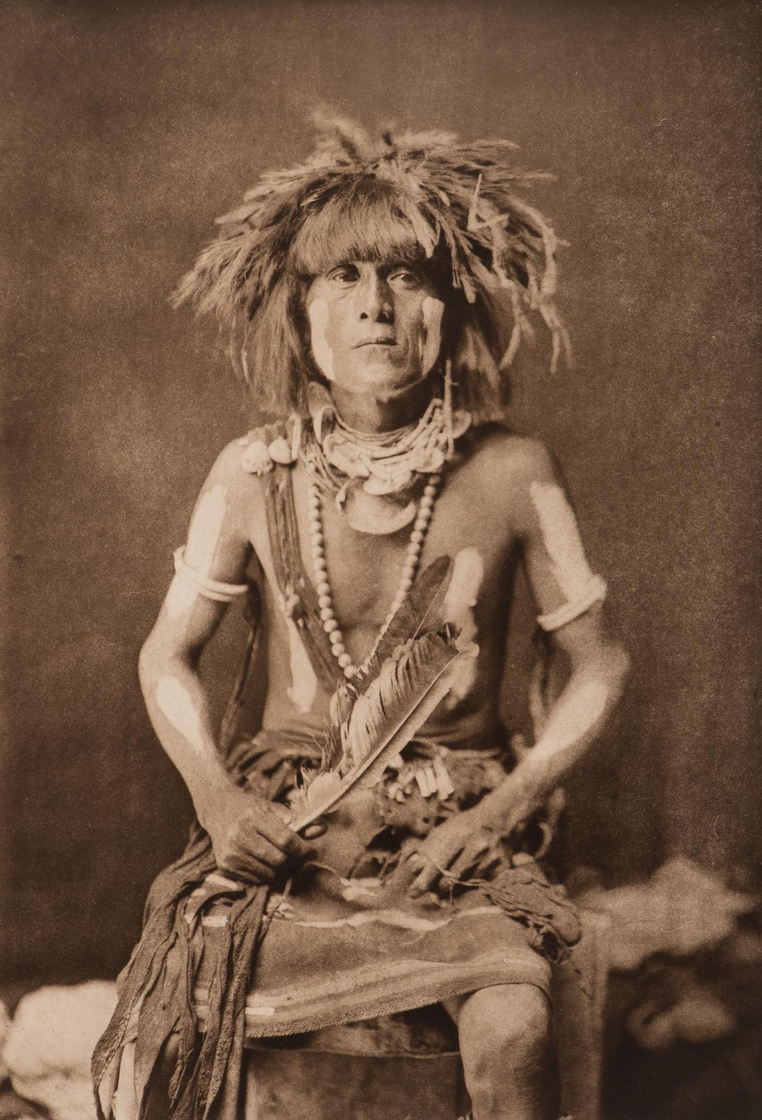 CURTIS, Edward (1868-1952), photographer. Hónovi - Walpi Snake Priest, with Totókya Day Painting . Portfolio photogravure.