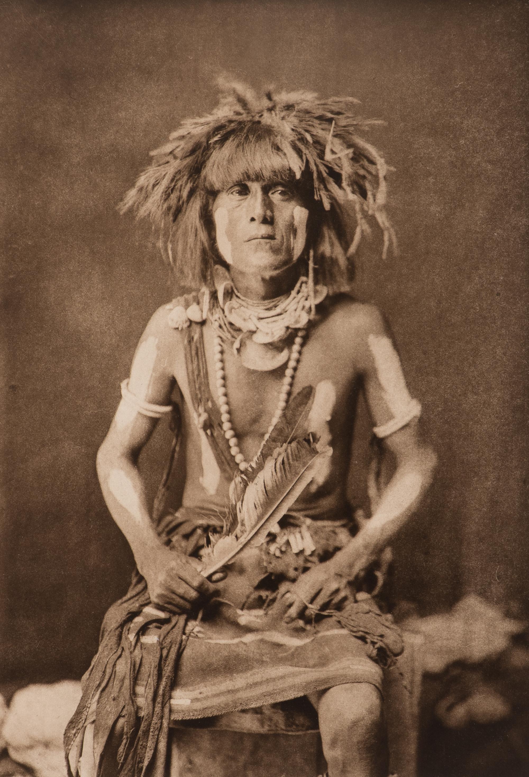CURTIS, Edward (1868-1952), photographer. Hónovi - Walpi Snake Priest, with Totókya Day Painting . Portfolio photogravure.