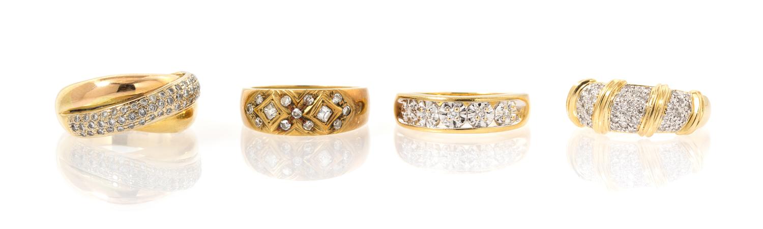 A Collection of 18 Karat Yellow Gold and Diamond Rings, 16.70 dwts.