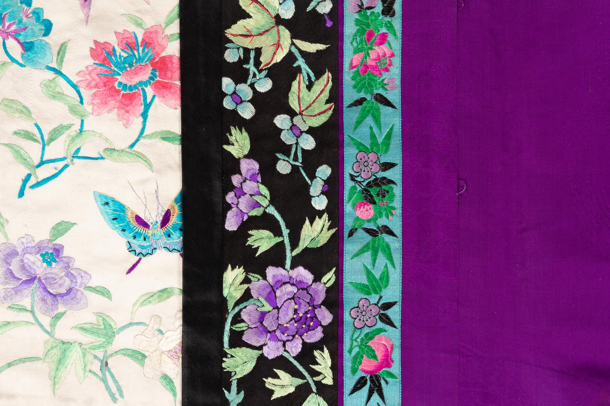 A Purple Ground Embroidered Silk Manchu Lady's Informal Robe