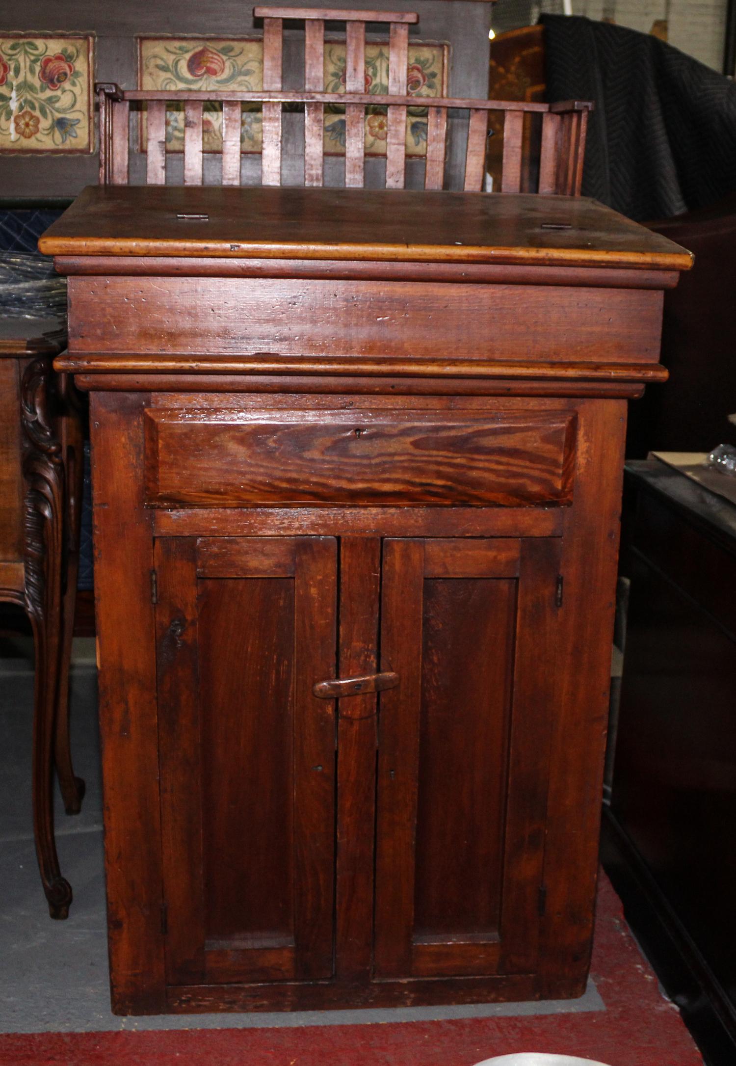An American Oak Lectern. Height 51 1/4 x width 28 x depth 23 1/2 inches.