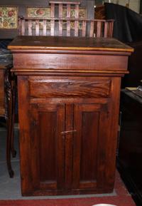An American Oak Lectern. Height 51 1/4 x width 28 x depth 23 1/2 inches.