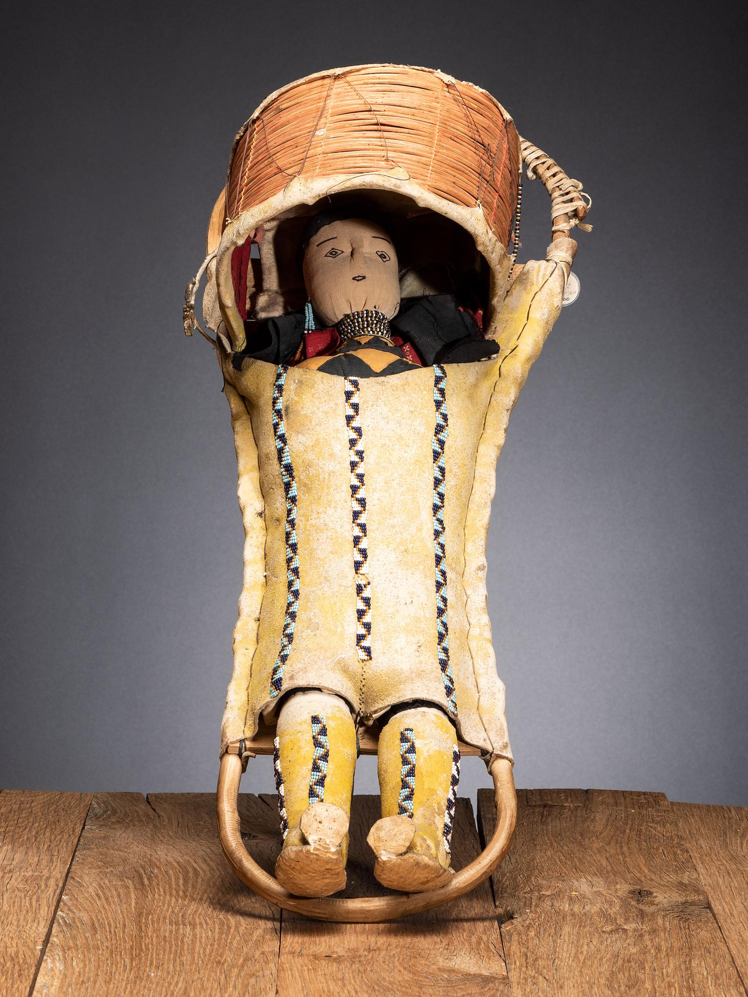 Apache Beaded Hide Cradle, with Doll