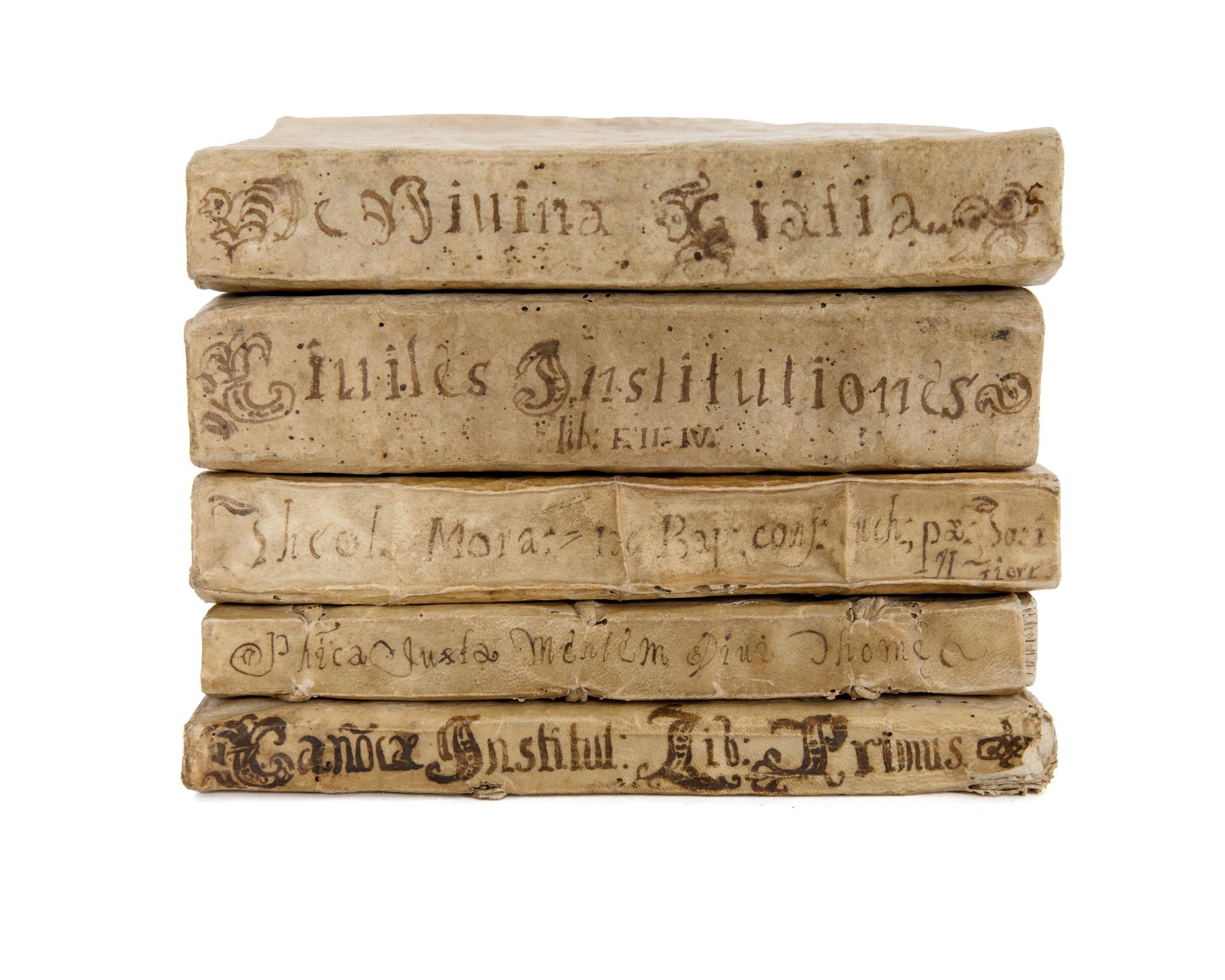 A Collection of Five Parchment Bound Manuscripts