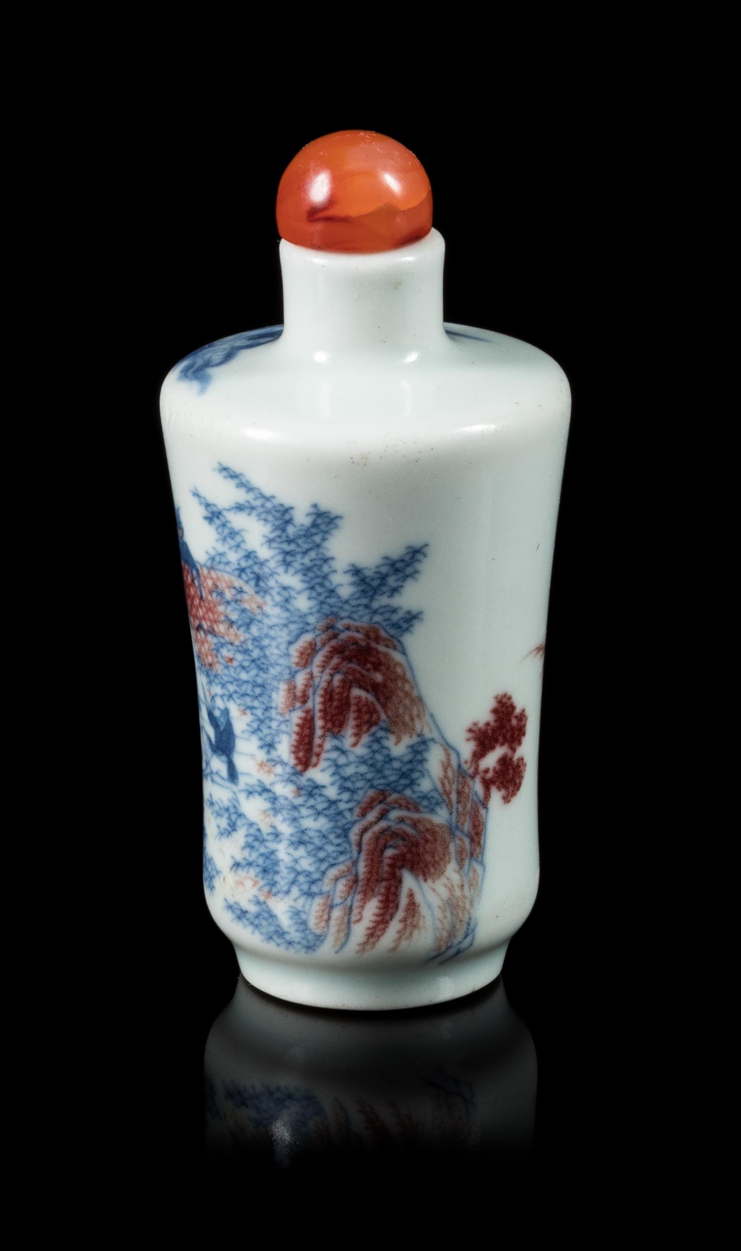 A Copper Red, Blue and White Porcelain Snuff Bottle Height overall 3 1/4 inches. — 19TH CENTURY
