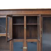 A Two-Tier Mahogany Pharmacy Cabinet 165" W x 15" D x 95" H — United States, 20th Century