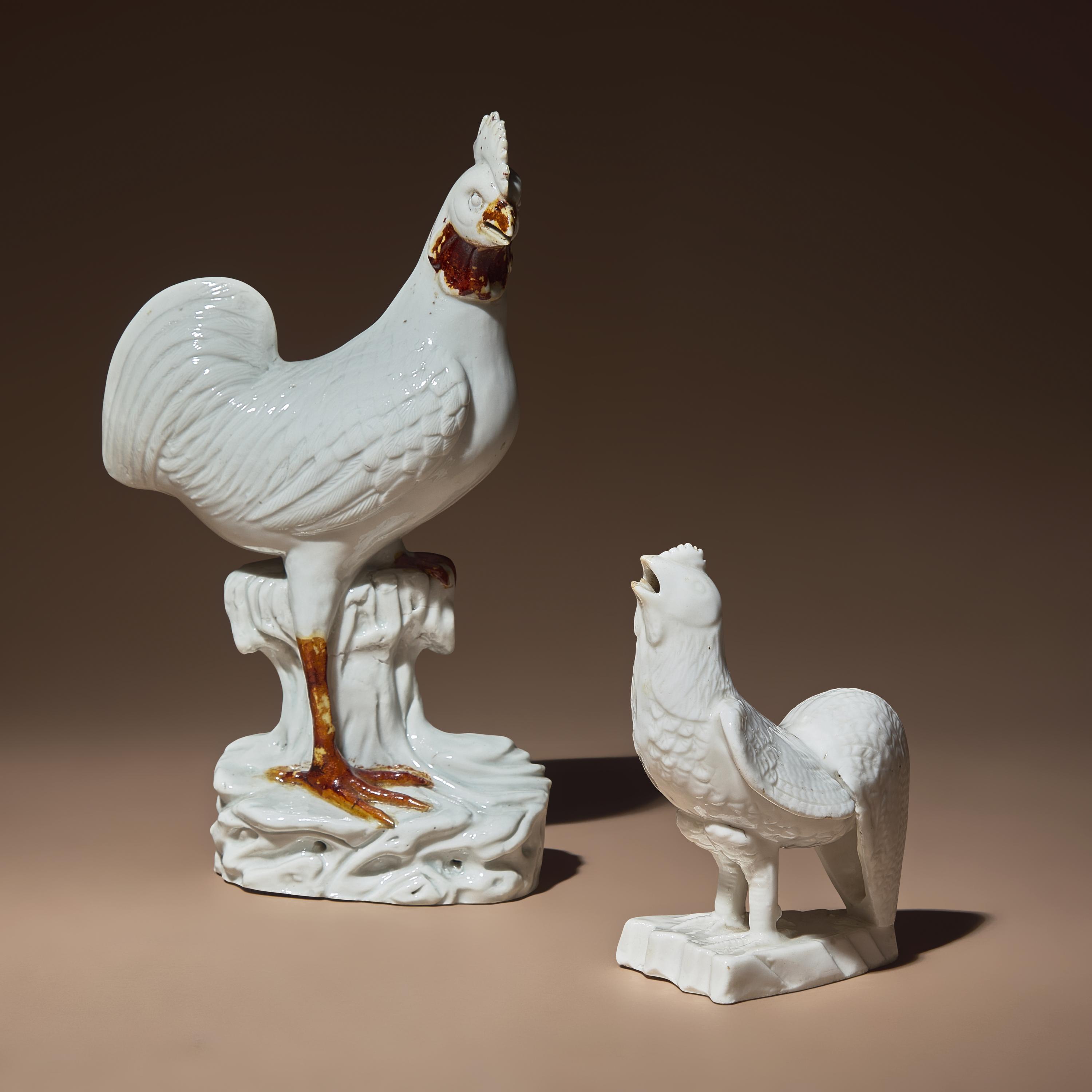 Two Chinese Blanc-de-Chine Porcelain Figures of Cockerels, 18th/19th Century — 清中期 德化白瓷雄鷄兩隻