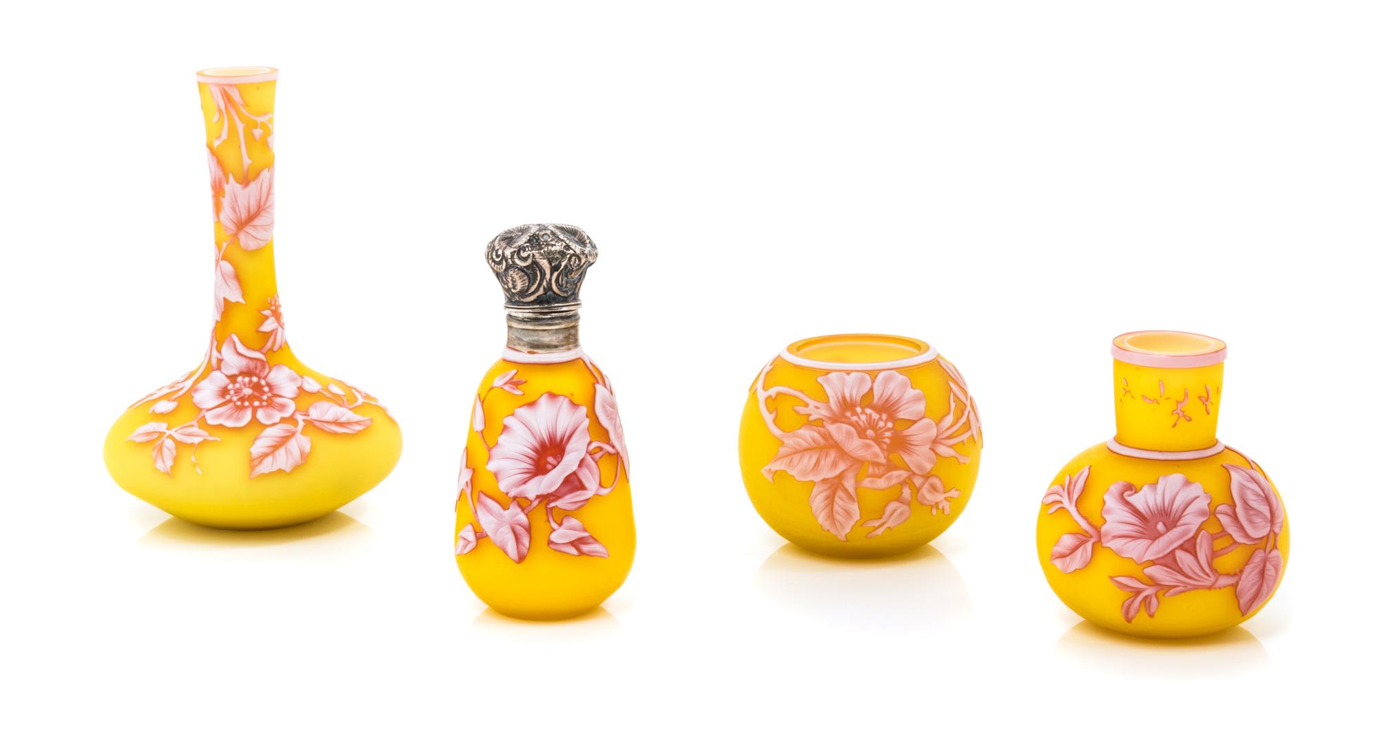 English, 19TH/20TH CENTURY, four cameo glass cabinet vases, comprisng two vases of bottle form, a spherical vase and a silver mounted s