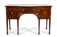 A Hepplewhite Serpentine Front Mahogany Sideboard Height 35 1/2 x width 54 1/8 x depth 24 1/4 inches. — CIRCA 1800