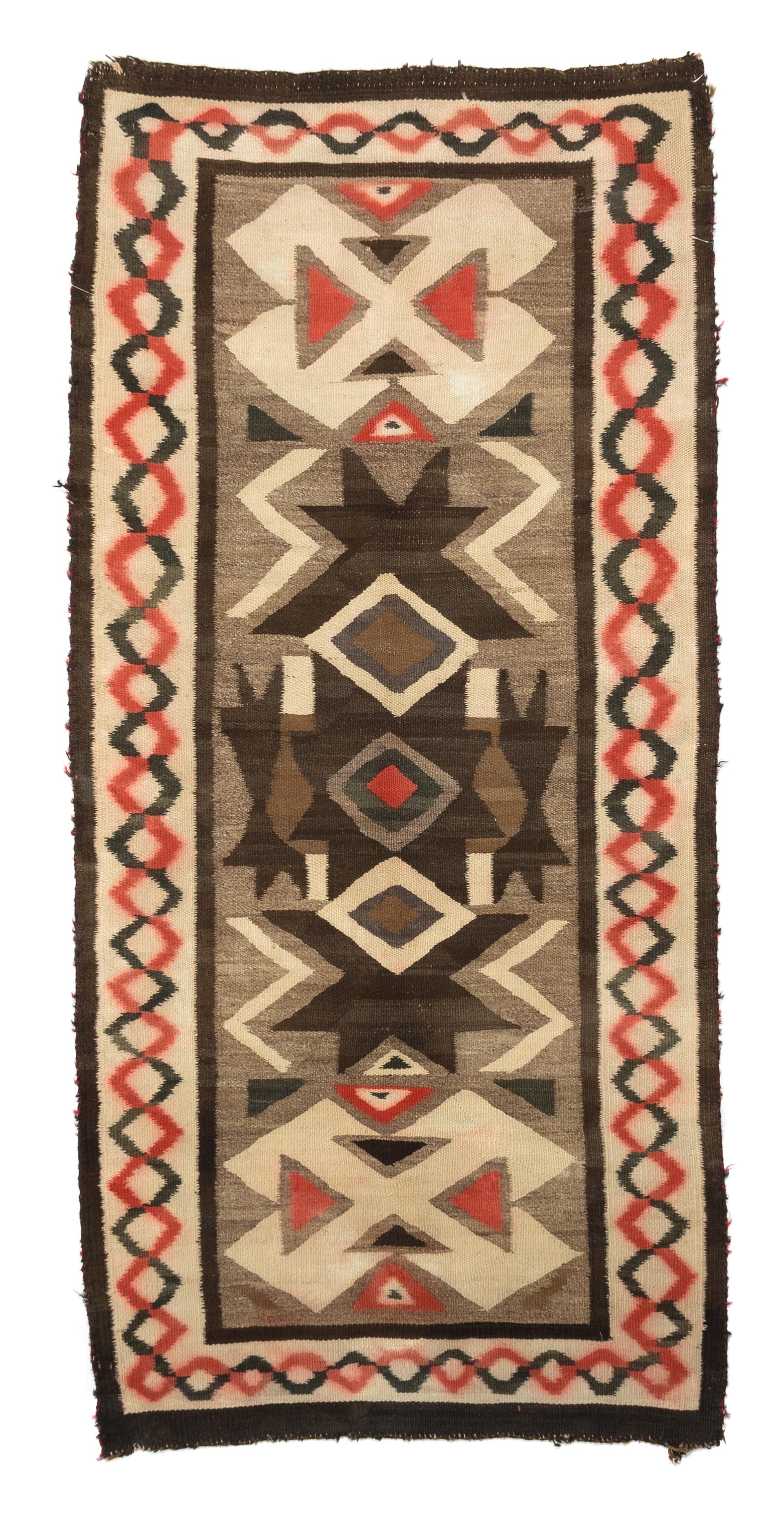 A Navajo Rug 30 x 60 inches.