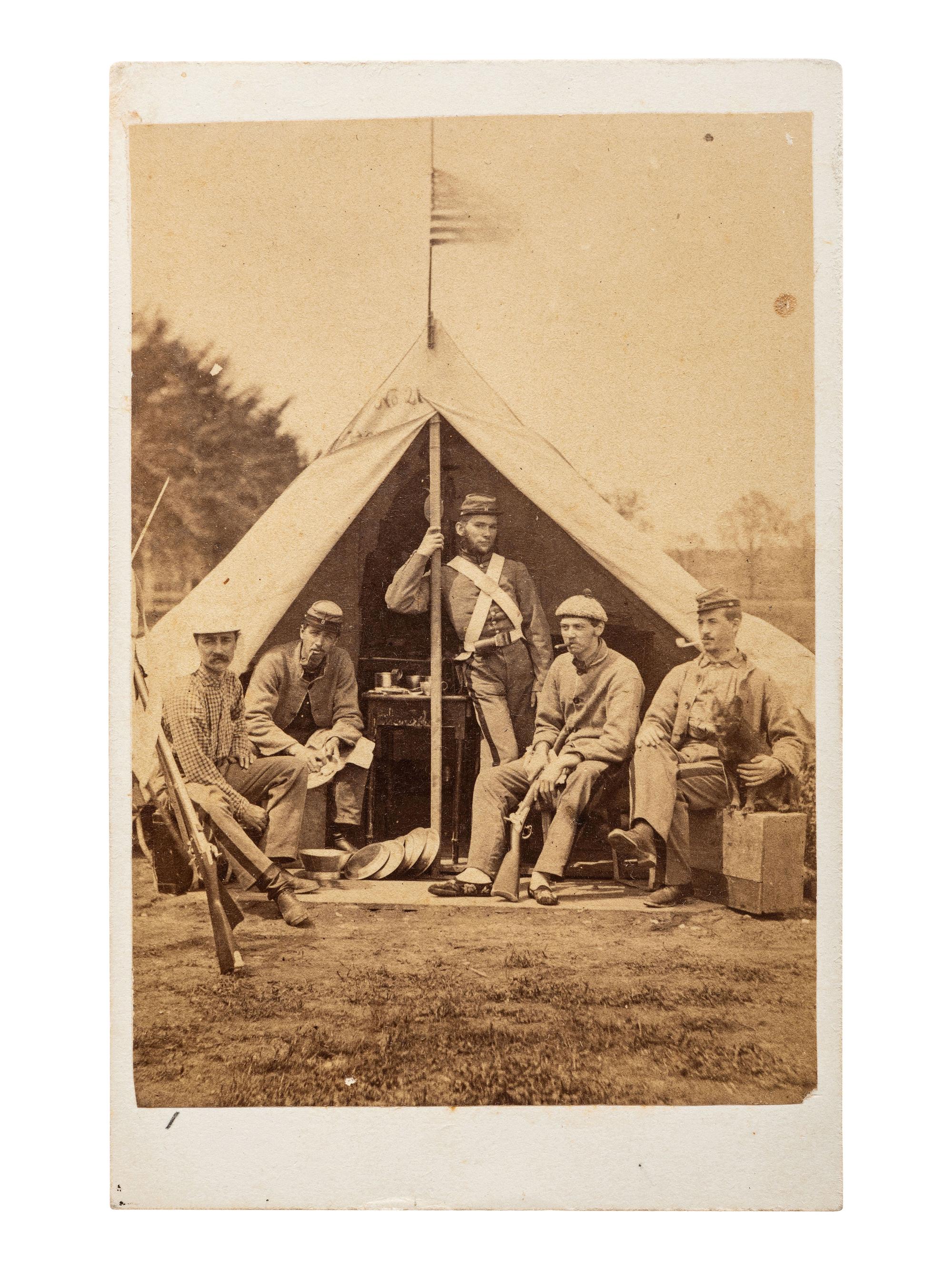[CIVIL WAR]. A pair of CDVs featuring soldiers, likely members of the 7th NY state militia, posed just outside of a tent at "Camp Cameron, May 1861."