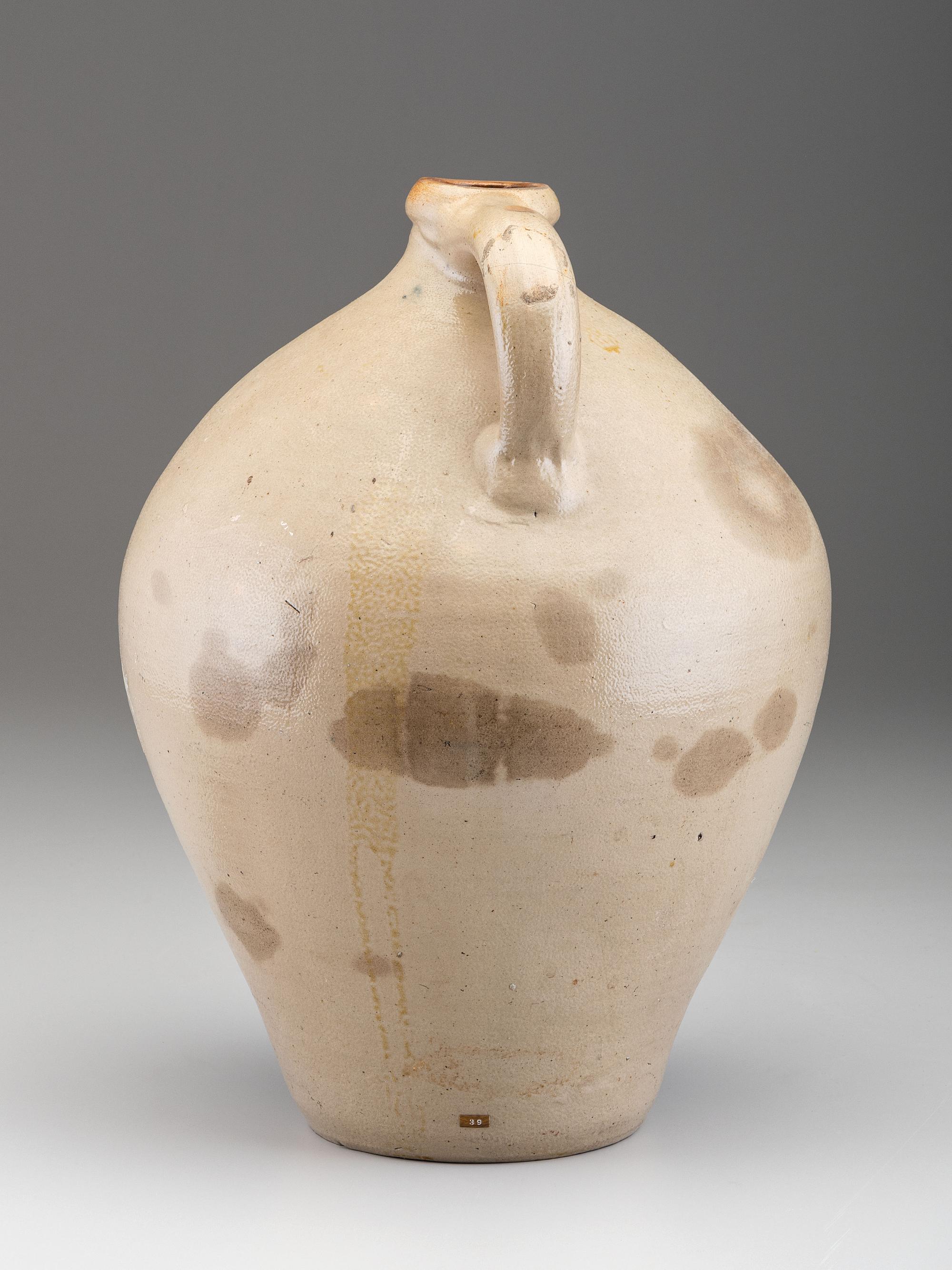 A Cobalt Decorated Stoneware Merchant's Jug